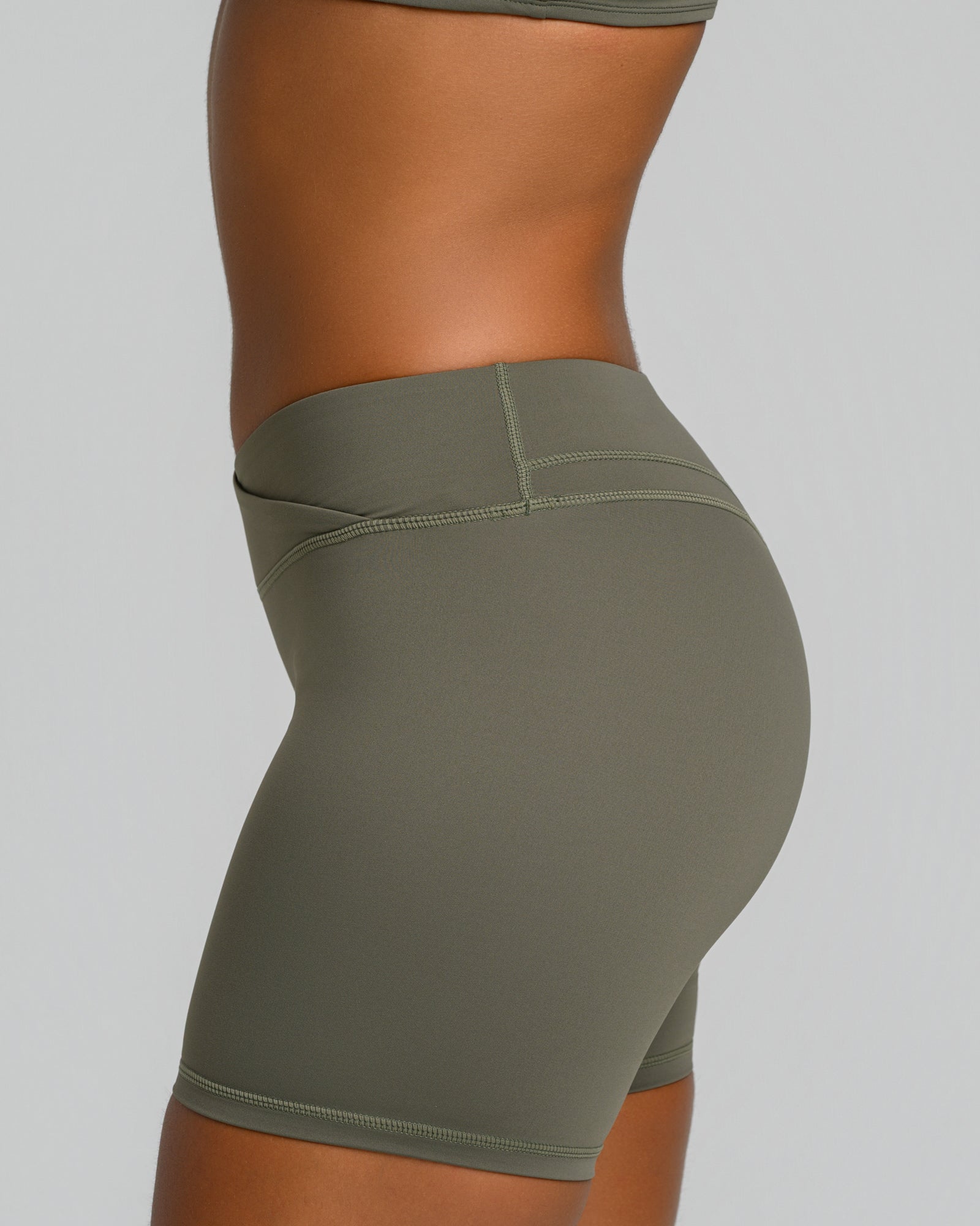 UNSTOPPABLE™ MID WAIST WRAP SHORTS OLIVE GREEN