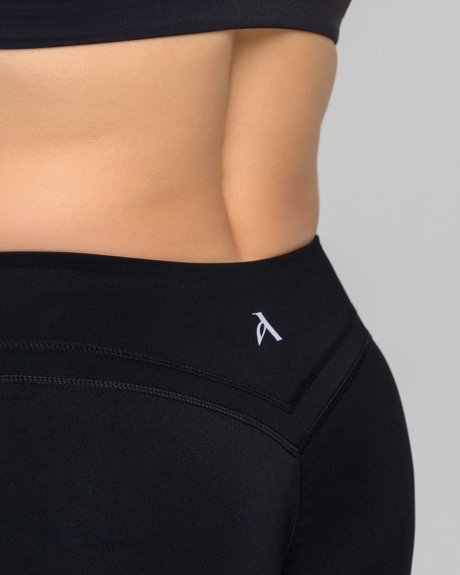 UNSTOPPABLE™ MID WAIST WRAP LEGGINGS BLACK