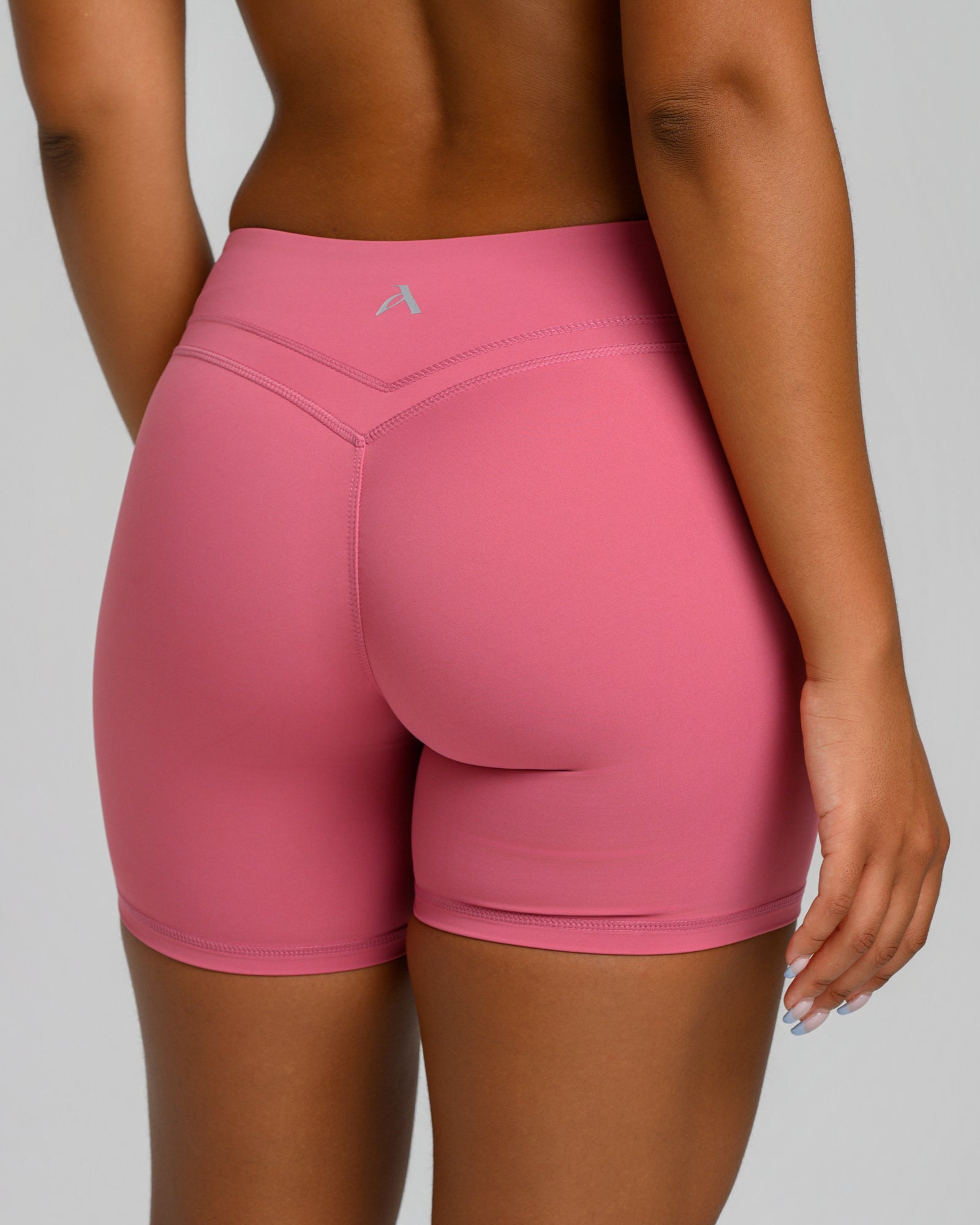 UNSTOPPABLE™ MID WAIST WRAP SHORTS DUSTY PINK