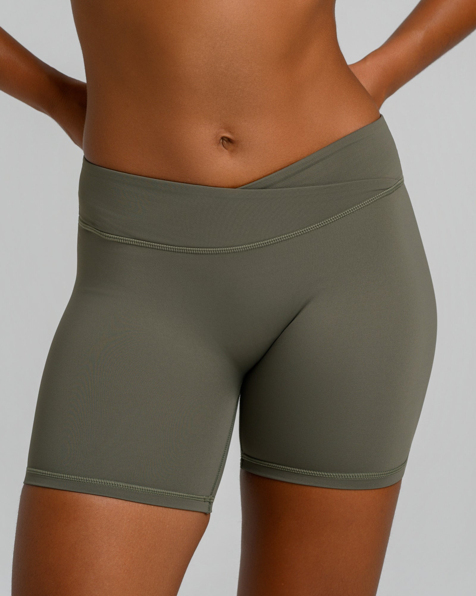 UNSTOPPABLE™ MID WAIST WRAP SHORTS OLIVE GREEN