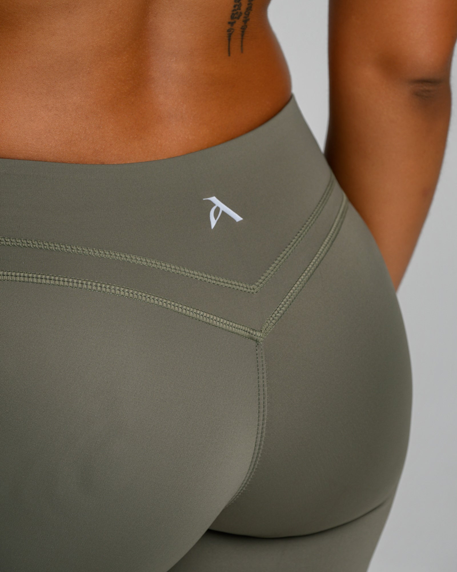UNSTOPPABLE™ MID WAIST WRAP SHORTS OLIVE GREEN